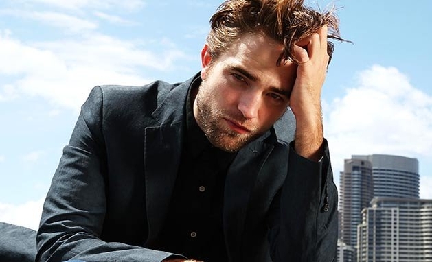 Após perdoar traição, Robert Pattinson faz sucesso em première australiana de 'Amanhecer - Parte 2'