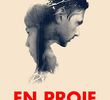 En proie