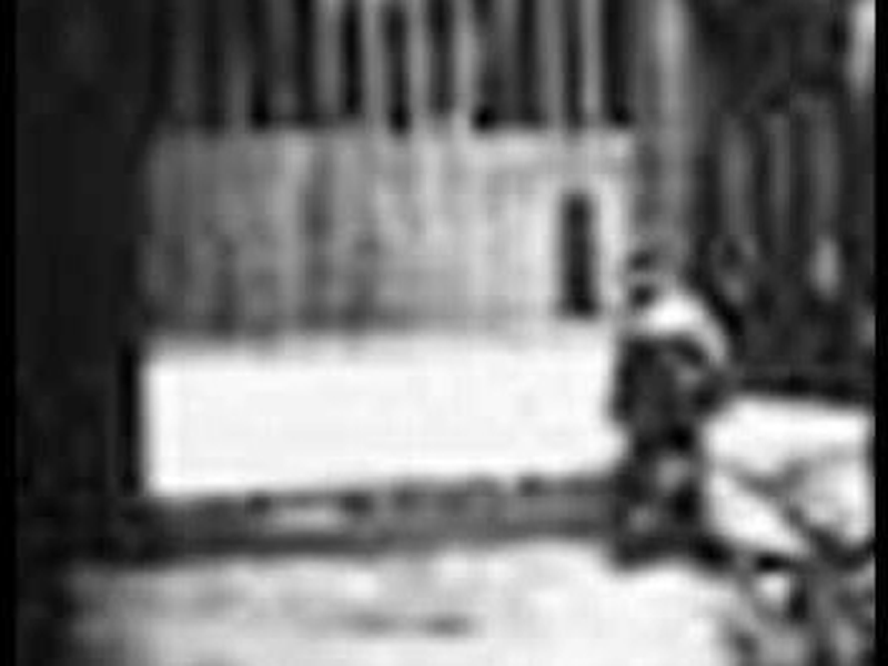 Foto 1 de Man Walking Around the Corner