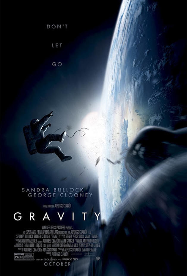 Sandra Bullock e George Clooney à deriva no espaço no trailer de GRAVIDADE, de Alfonso